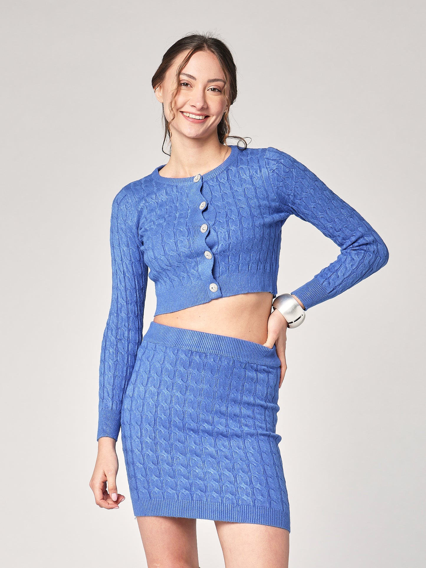 Completo golfino e gonna trecce