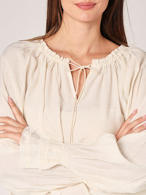 Maglia collo con nodo