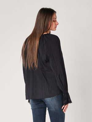 Maglia collo con nodo