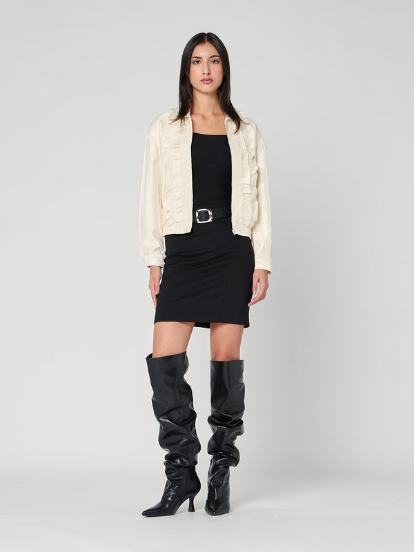 Giacca lucida con zip e balze