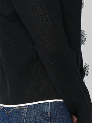 Giacca maglia con spille rosa
