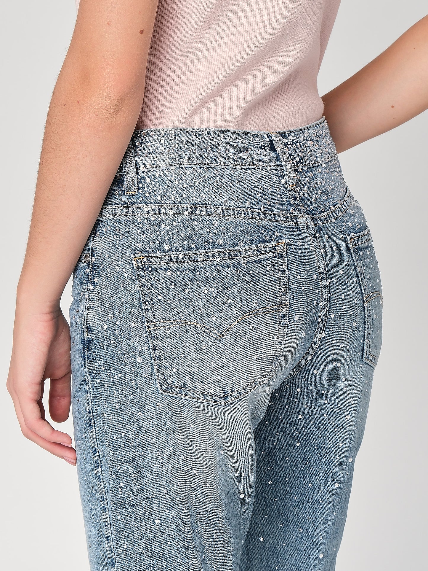 Jeans gamba larga con strass