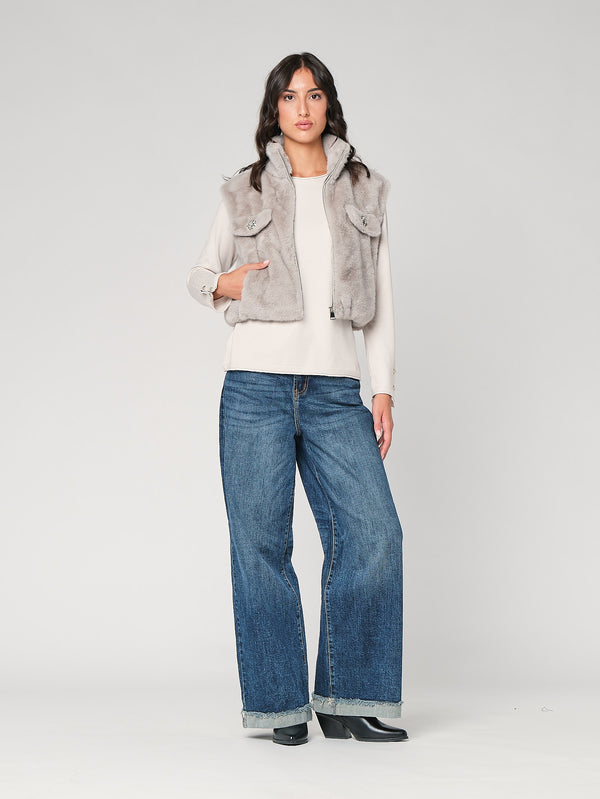 Gilet in pelliccia con bottoni gioiello