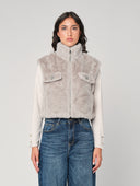 Gilet in pelliccia con bottoni gioiello