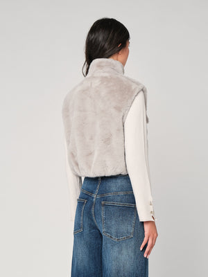 Gilet in pelliccia con bottoni gioiello