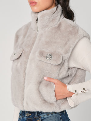 Gilet in pelliccia con bottoni gioiello