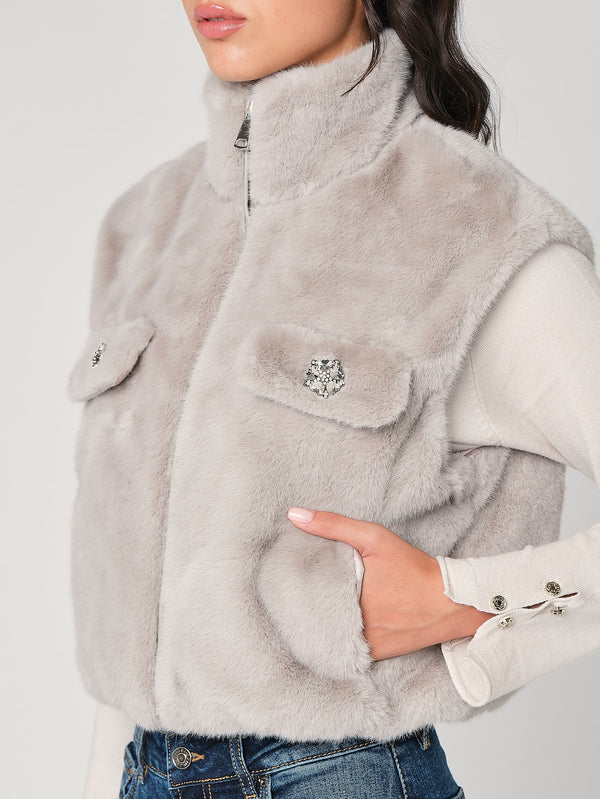 Gilet in pelliccia con bottoni gioiello