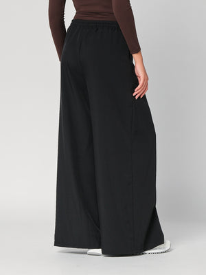 Pantalone palazzo con pinces