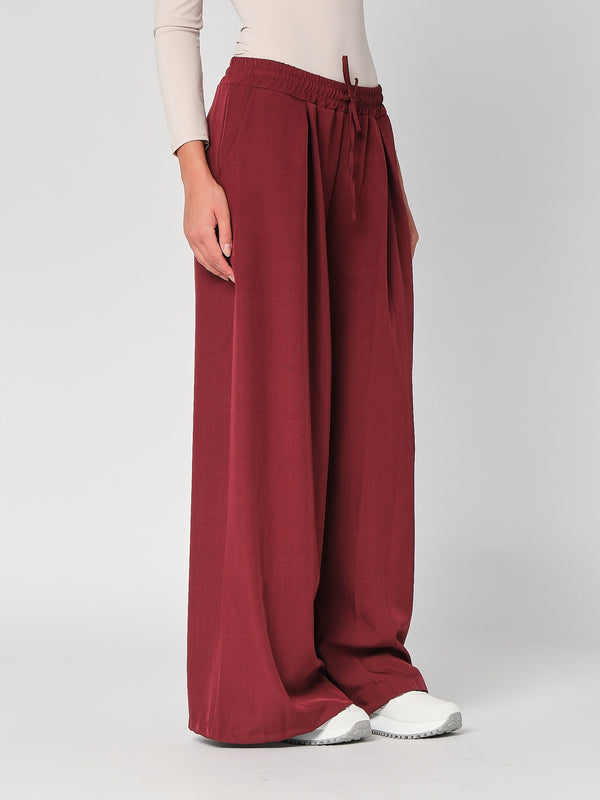 Pantalone palazzo con pinces