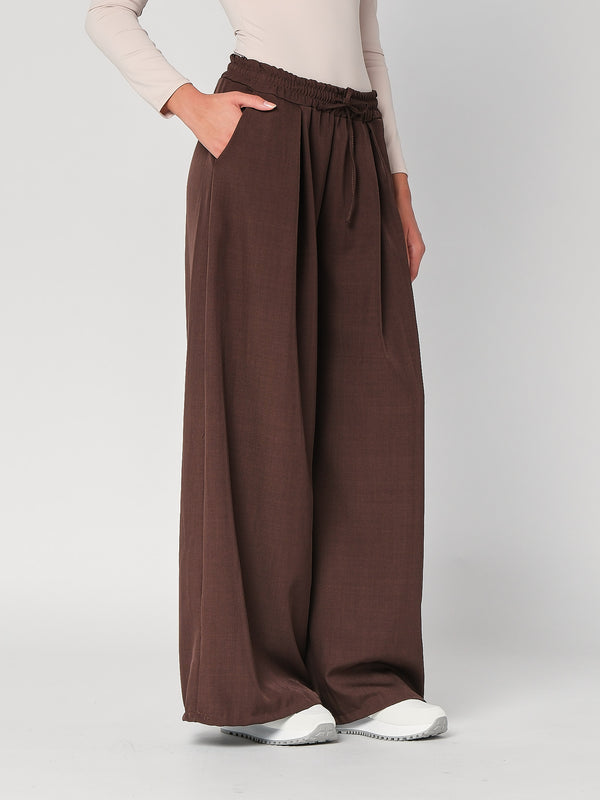 Pantalone palazzo con pinces