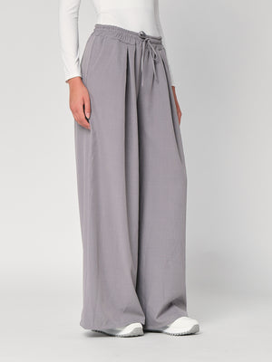 Pantalone palazzo con pinces