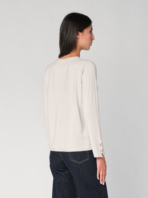 Maglia con bottoni polso