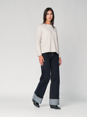 Maglia con bottoni polso
