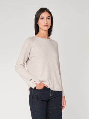 Maglia con bottoni polso