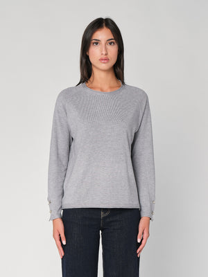 Maglia con bottoni polso