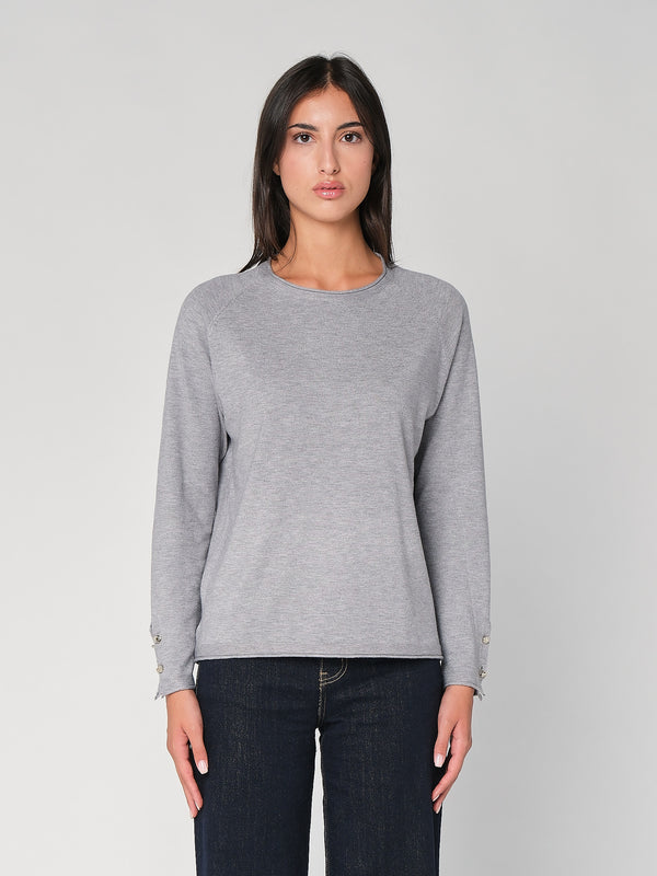 Maglia con bottoni polso