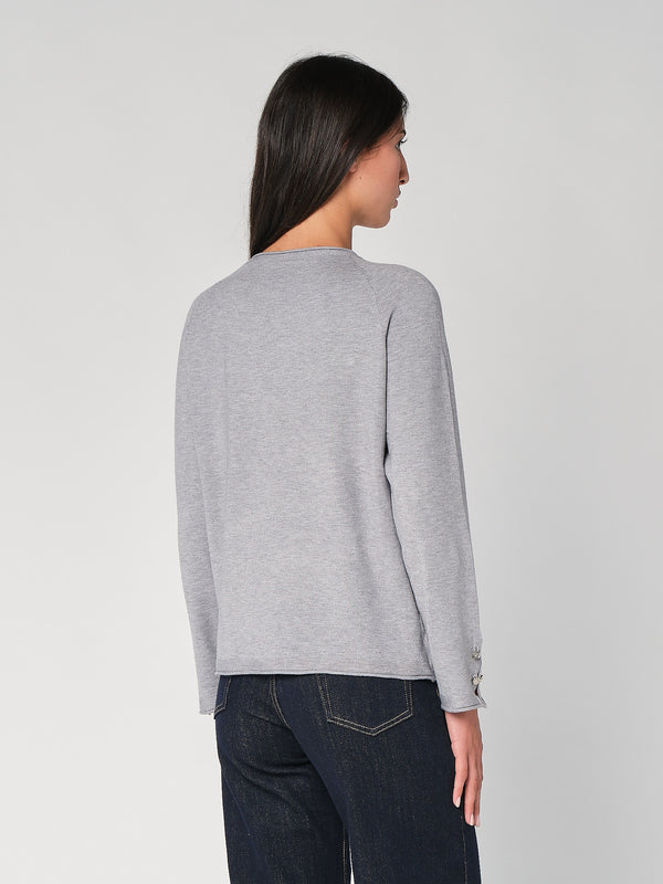 Maglia con bottoni polso