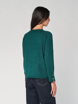 Maglia con bottoni polso