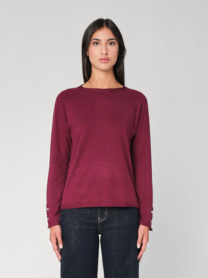 Maglia con bottoni polso