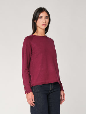 Maglia con bottoni polso
