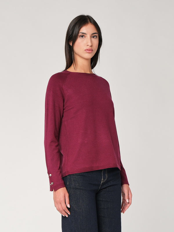 Maglia con bottoni polso