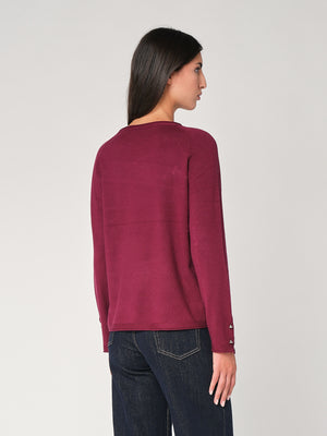 Maglia con bottoni polso