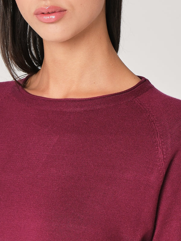 Maglia con bottoni polso