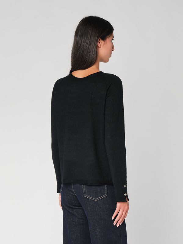 Maglia con bottoni polso