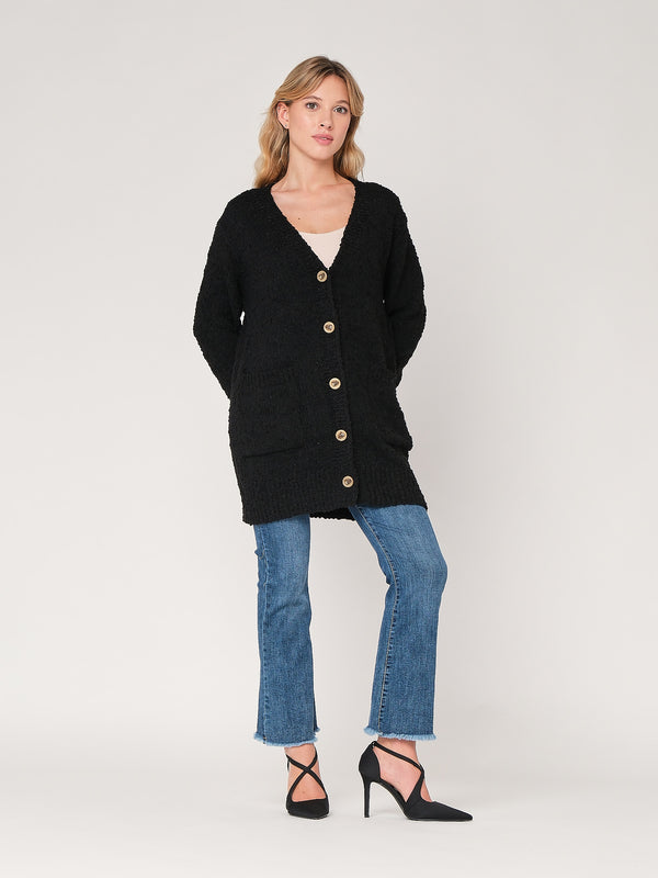 Maglione con bottoni e tasche