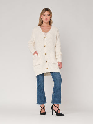 Maglione con bottoni e tasche