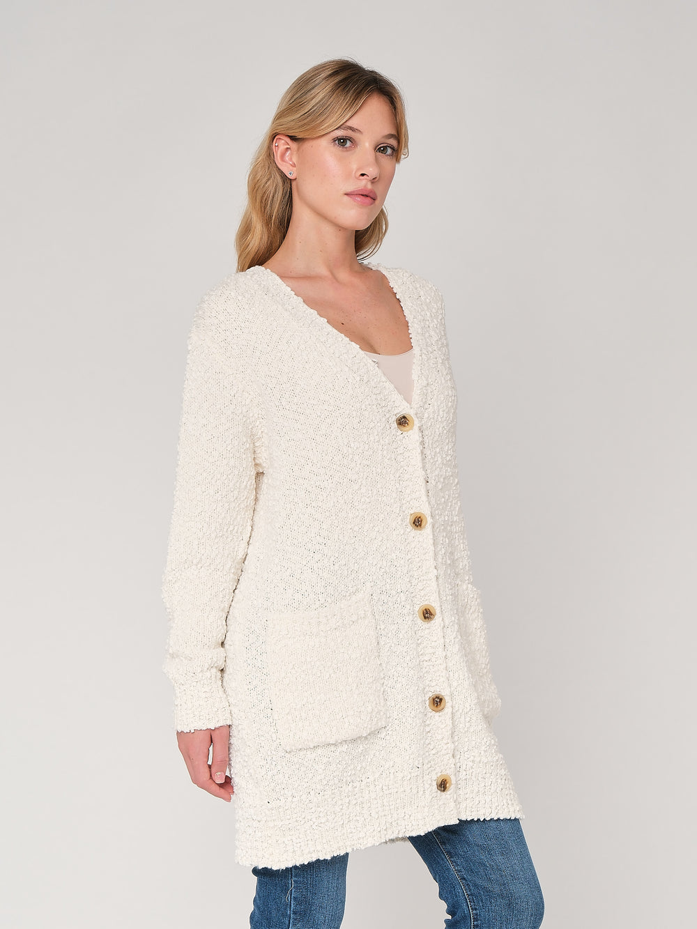 Maglione con bottoni e tasche