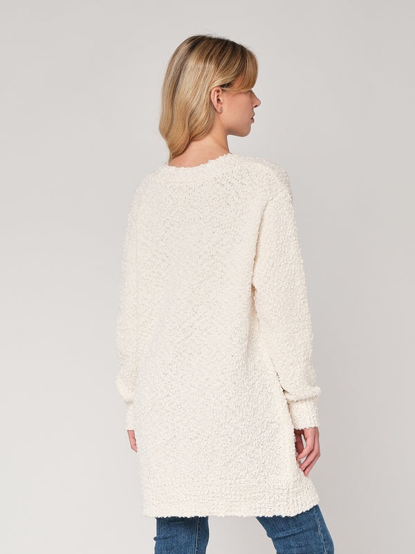 Maglione con bottoni e tasche