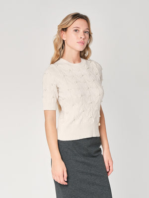 Maglia a trecce con perline