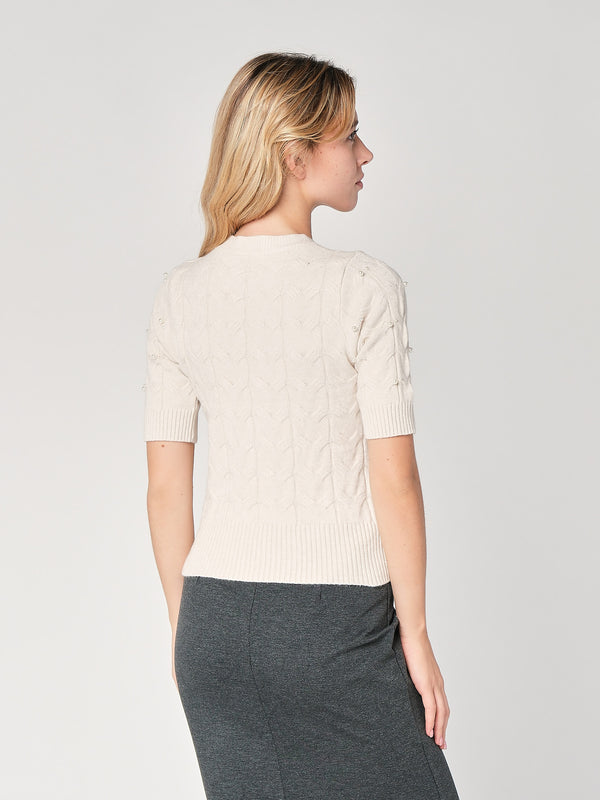Maglia a trecce con perline