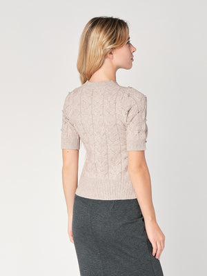 Maglia a trecce con perline