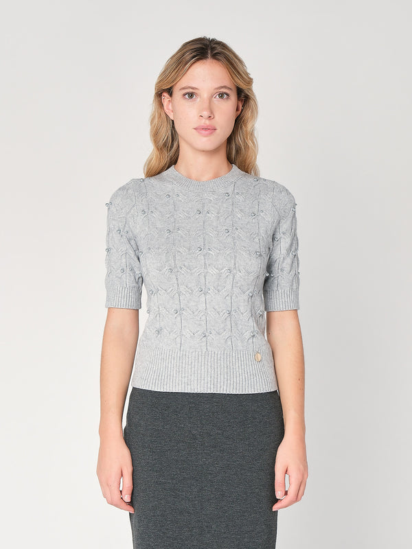 Maglia a trecce con perline