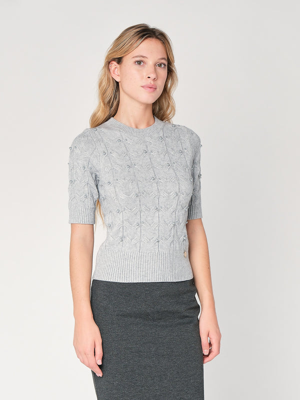 Maglia a trecce con perline
