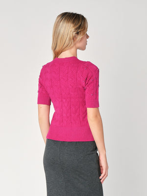 Maglia a trecce con perline