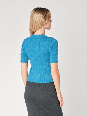 Maglia a trecce con perline
