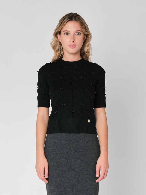 Maglia a trecce con perline
