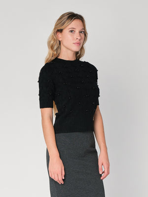 Maglia a trecce con perline