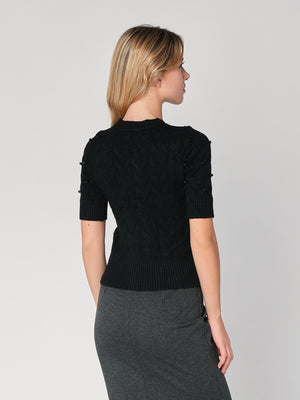 Maglia a trecce con perline