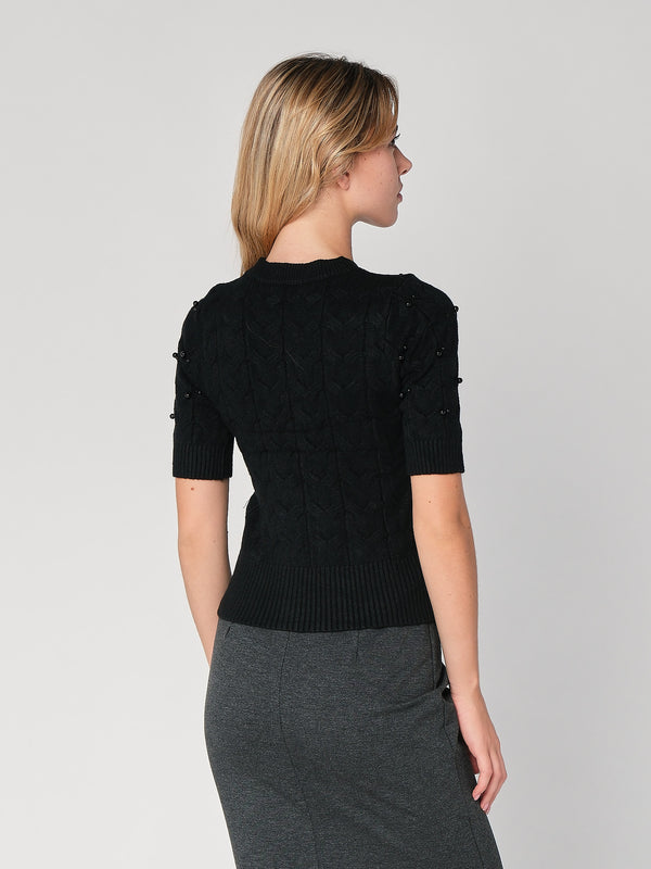 Maglia a trecce con perline