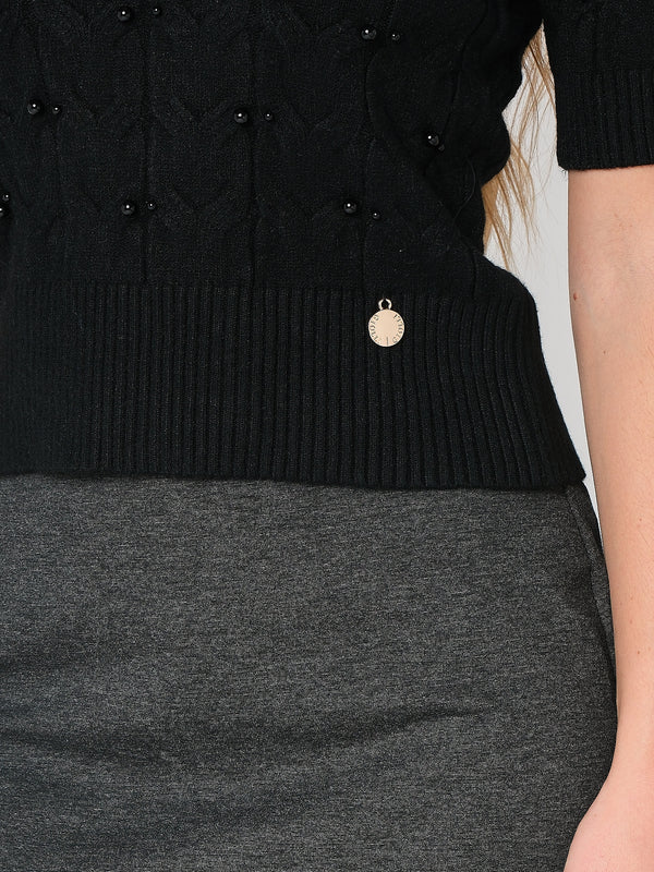 Maglia a trecce con perline