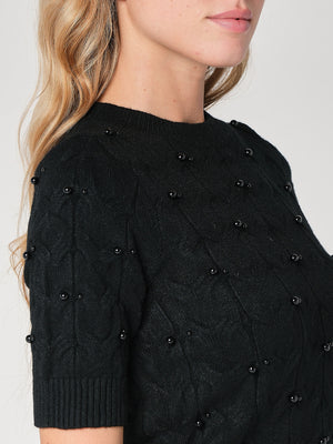 Maglia a trecce con perline
