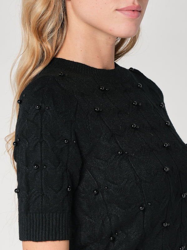 Maglia a trecce con perline
