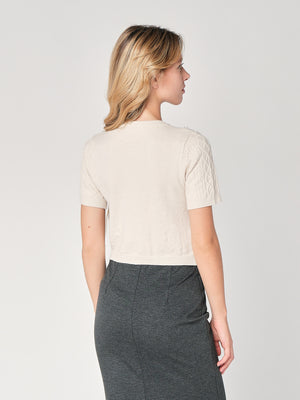 Maglia a trecce con perline