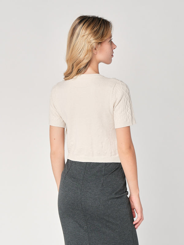 Maglia a trecce con perline