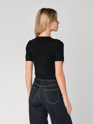 Maglia a trecce con perline