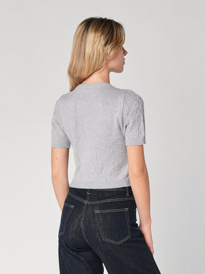 Maglia a trecce con perline